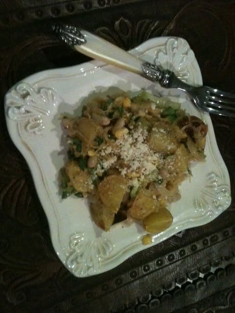 Sauerkraut salad roasted fingerlings grilled onions corn pine nuts great northern beans and shredded romain a ground mustard dressing and grated parmesan