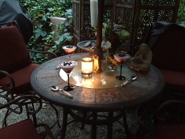a parfait desert by candelight