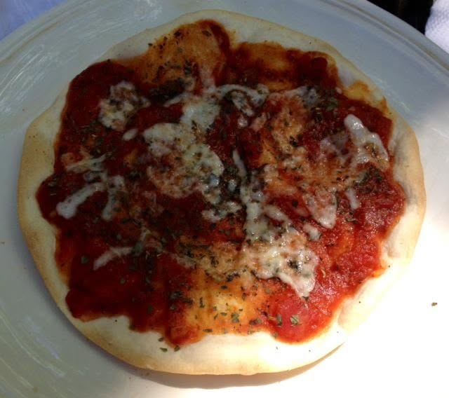 Great idea-marinara with Italian herbs, garlic and shredded mozzarella on an uncooked flour tortilla at 450 for six minutes. Crispy goodness
