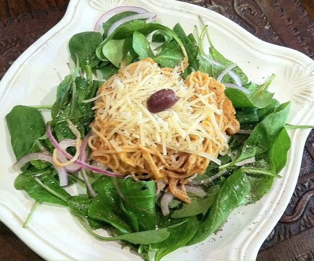 Pasta with brown butter, mazithra on a bed of grees