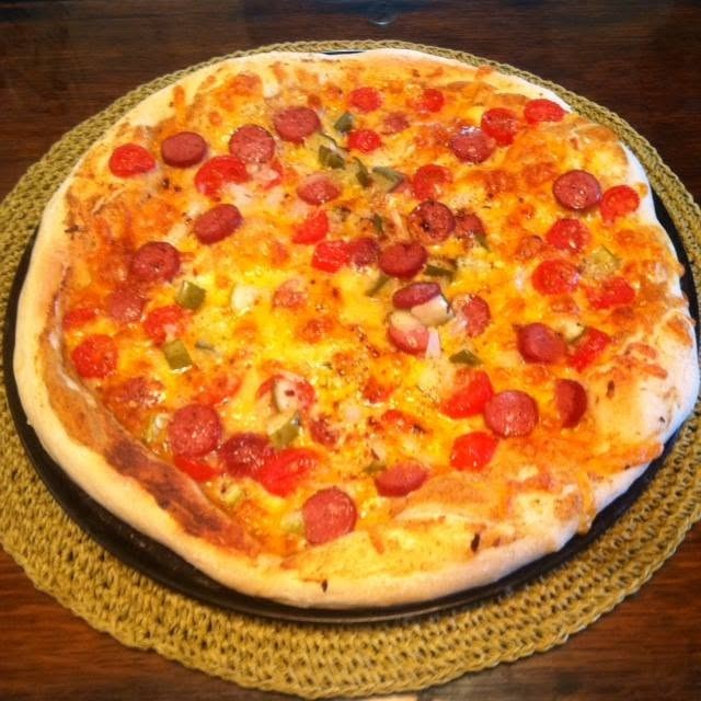 Patriots Day Pizza Hand toss a nice pizza doug,slather with spicy mustard cheeses cut up hot dogs tomatoes pickles and white onion -HD chili is good too