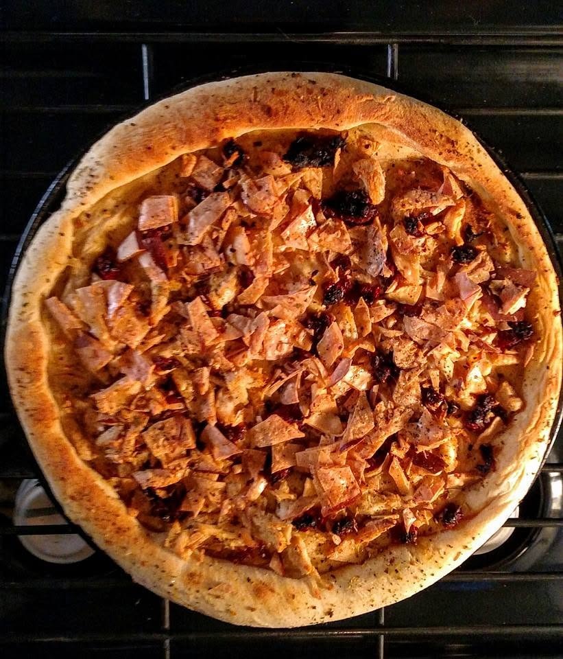 rosemary infused olive oil, shedded grilled chicken breast, sun dried tomatoes, smoked dutch gudda butter and fresh cracked black pepper